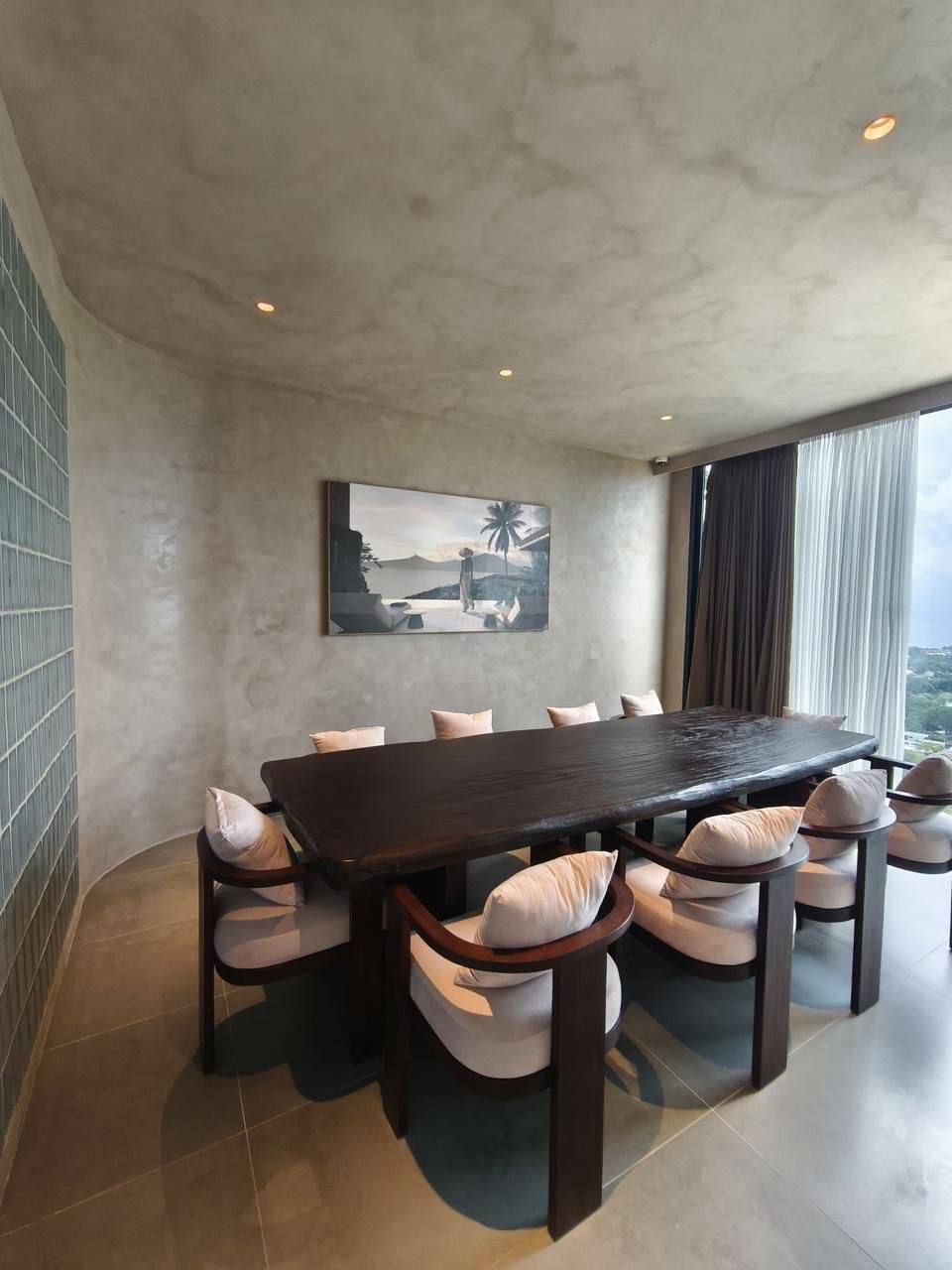 Office meeting room with a long dark table