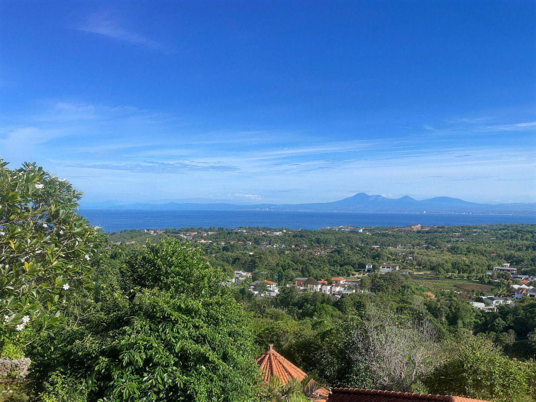 Indian Ocean and the volcanoes of Java seen from the land
