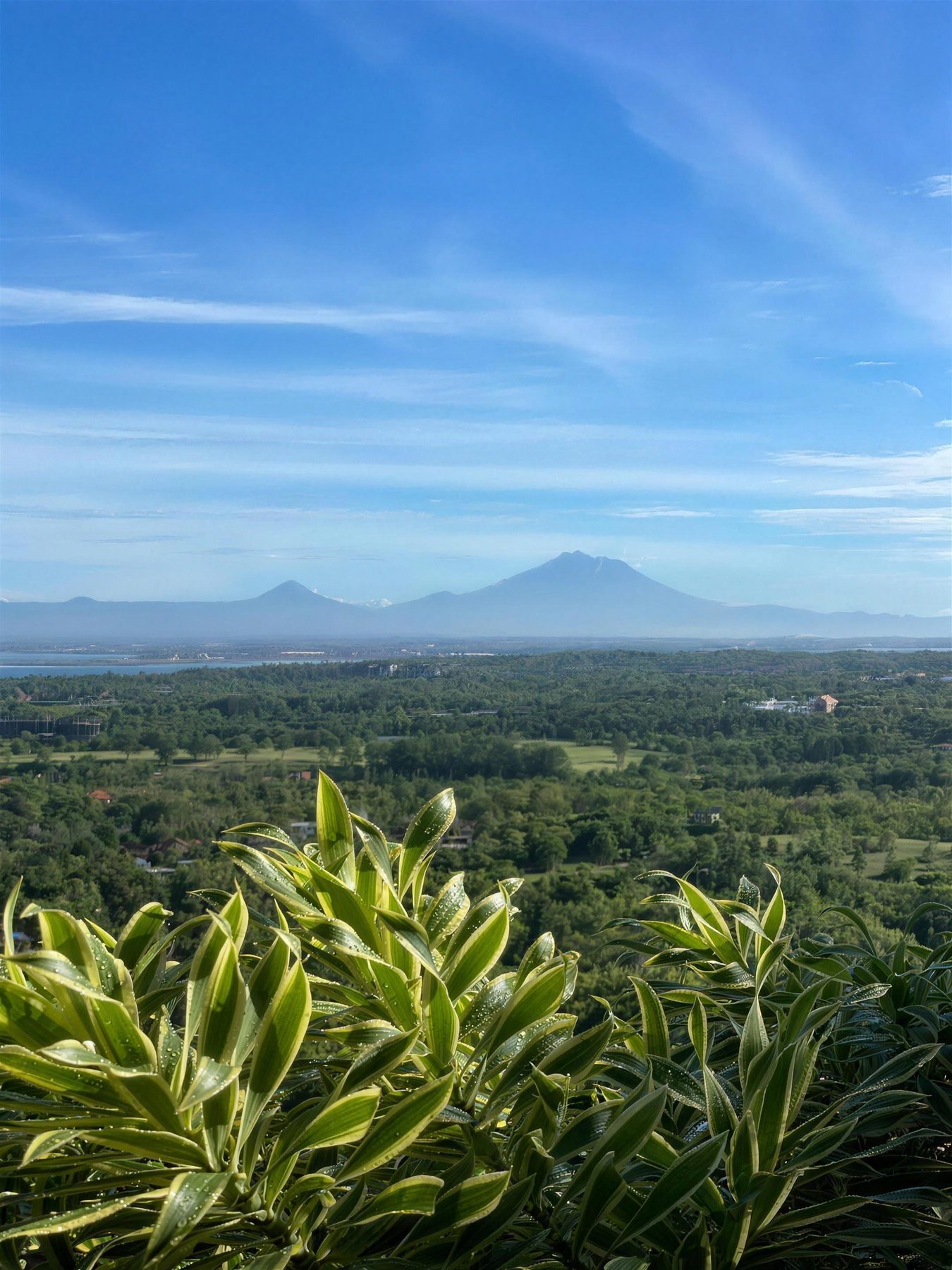 Volcano view over green hills